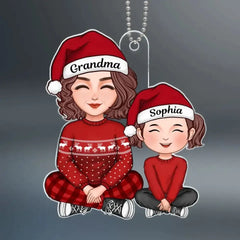 Mignon grand-mère grand-père et petit-enfant assis jambes croisées cadeau de Noël ornement acrylique personnalisé